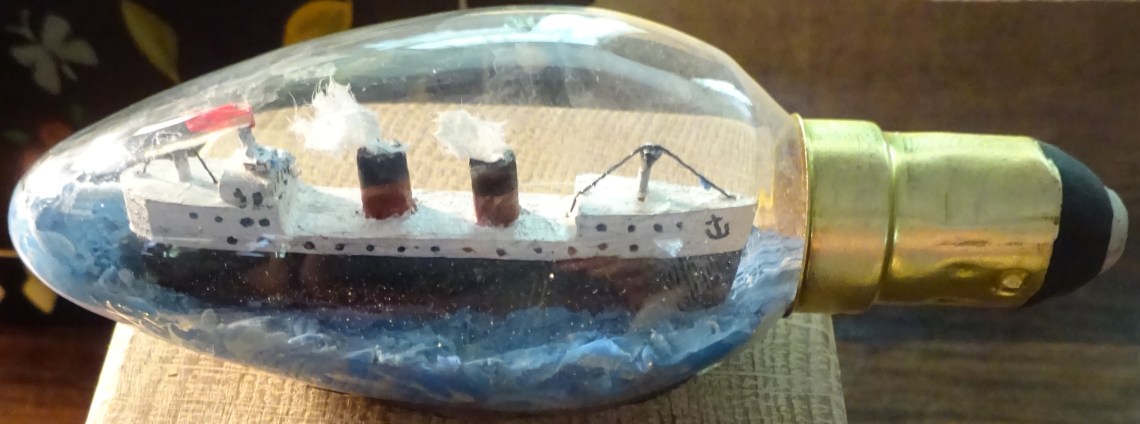 Steam ship in a candle bulb